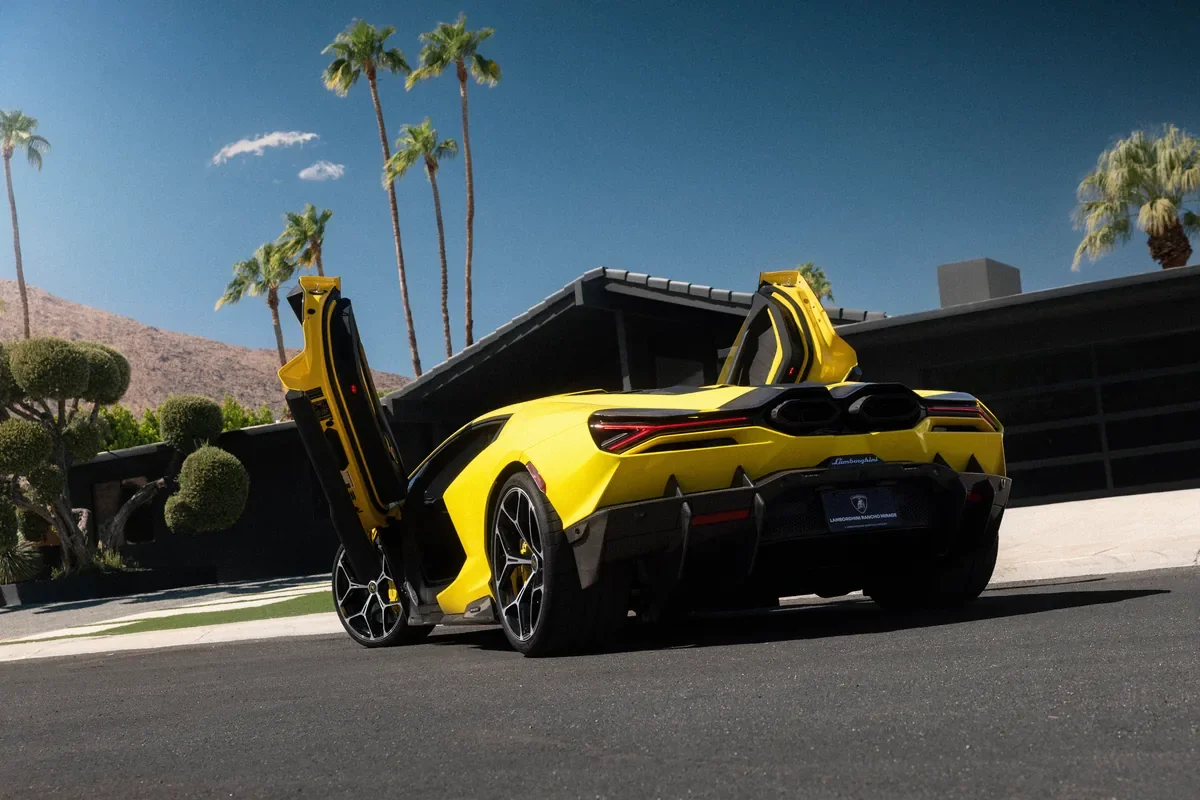 Yellow Lamborghini Revuelto with its doors raised